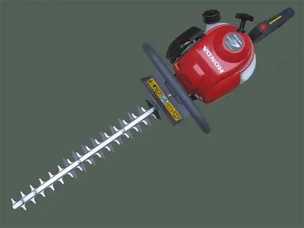 Twin-blade hedge trimmers